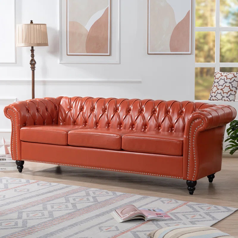 THE CASA ORO® 84.65" Chesterfield Sofa Faux Leather Three Seater Sofa with Rolled Arm(Orange Faux Leather)